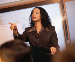 Woman conducting meeting or seminar
