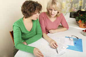 daughter and mother discussing healthcare 
