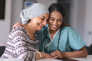 nurse and patient smiling