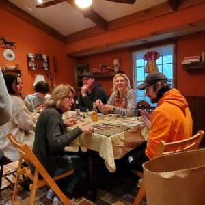Family and friends making clay hearts for Samaritan.