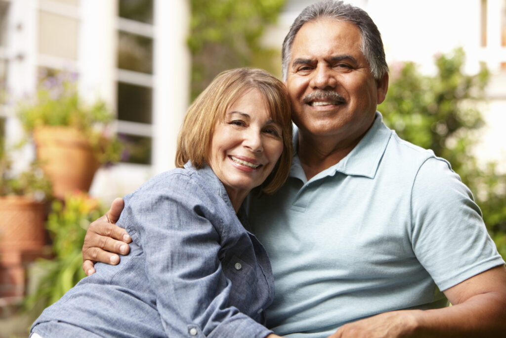 Senior couple relaxing in garden