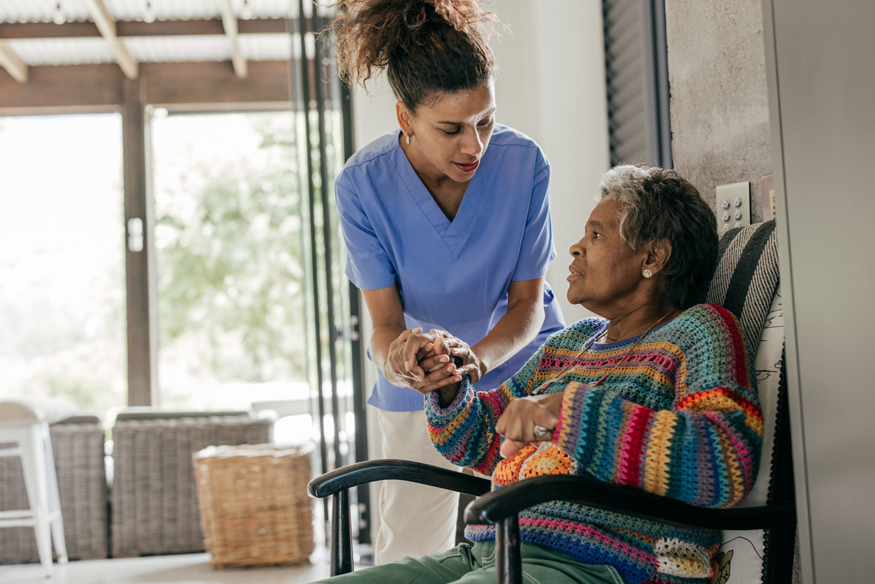 nurse helping patient