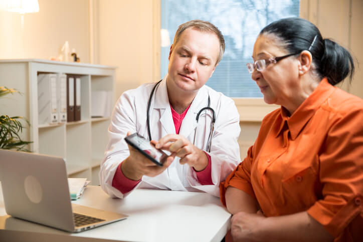 Doctor showing patient results