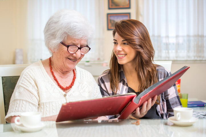 Senior woman with volunteer