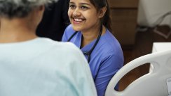 Cheerful nurse with patient