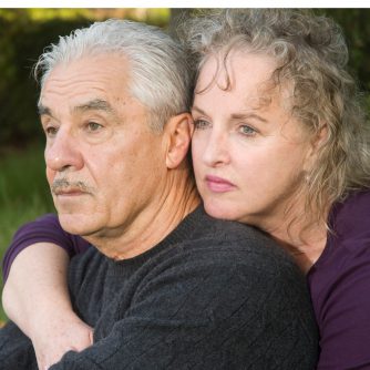 older couple hugging